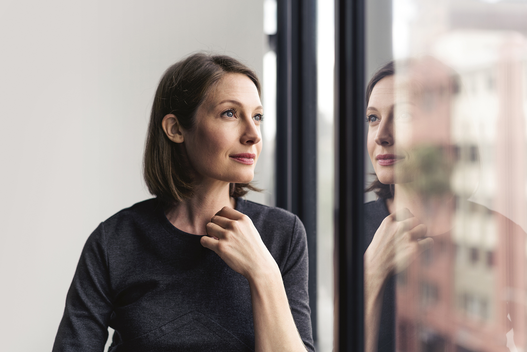 Woman looking at the windows